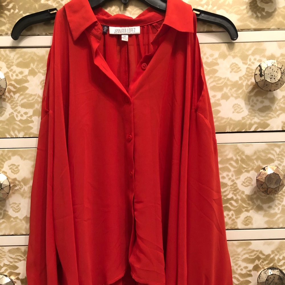 Jennifer Lopez burnt orange cold shoulder top